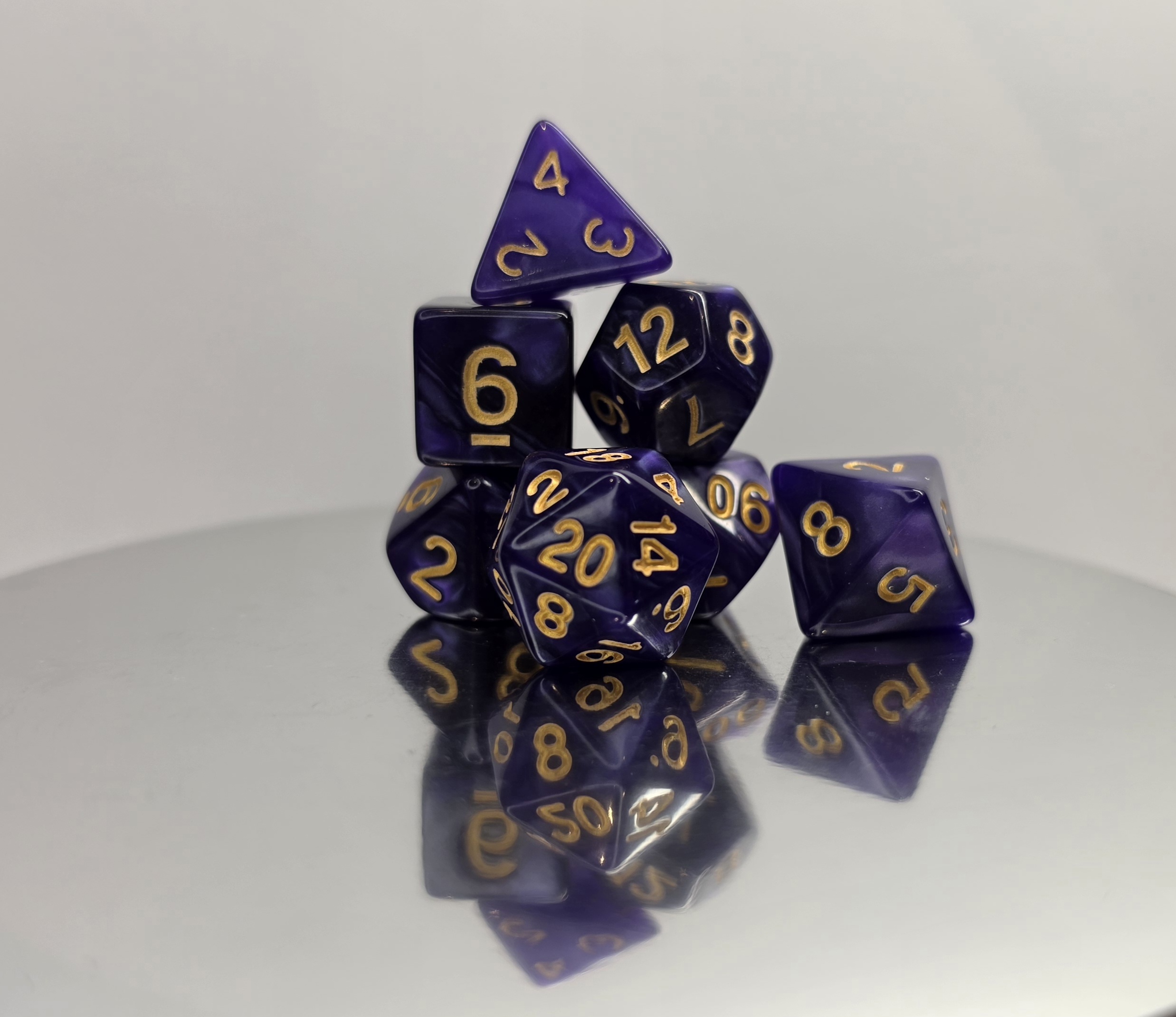 Deep Purple Swirl Dice Set with Gold Embossed Numbers